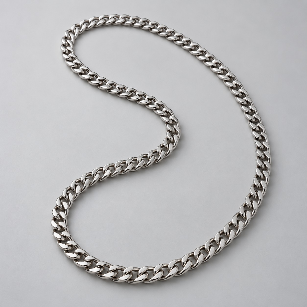 Silver-tone chain, editorial styling concept
